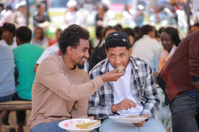 Youth sharing a meal